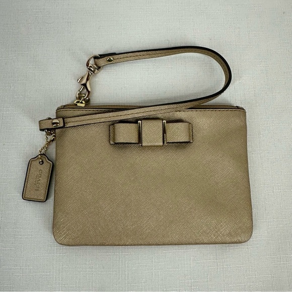 Coach Darcy Gold Leather Bow Wristlet - Picture 1 of 17